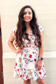 This dress was perfect for my graduation! It is very comfortable and has a button in the boob area, so it keeps it classy. Very helpful for ladies with bigger chests like me! I usually do not like flowery prints, but this one is beautiful. - Elizabeth M.