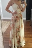 It's a true wrap dress, so it works well for folks with a larger bust and small waist. The straps are adjustable too, which is great for short people like me. Even with the shortened straps though, it was still quite long. Thankfully I plan to wear it with 5" tall wedges, so it just barely works without altering (I'm wearing them in the photo). The only thing that didn't work for me was the button closure on the top. It was too high to look right/stay closed with my chest size and the threads are already coming undone just after trying it on. I'll probably have to remove it and relocate it to a lower spot for a little extra security against potential wardrobe malfunctions. - Alexandria W.