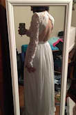 *Ignore the mess*
I liked this dress and if I hadn't found another I think it's the dress I was going to choose. I just didn't feel like a bride in this one. The XS was a little small around my rinse/waist, but the arms fit great! I also got the small and the arms were a little loose. Definitely would have to be hemmed. My mom LOVED this one. - Rachael V.