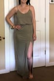 The color looks a little darker in person, but that's actually a good thing. The fabric is very soft and very stretchy. I think this is easily dressed up or down depending on the occasion. The slit may be a little high for some people with bigger hips or a bigger booty, but I think for me it was okay. - Sarah H.