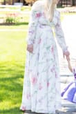 Okay this dress is beautiful! It has a lovely weight to it that makes it feel more expensive than it is. A couple of things to note, it is very low cut as well as very long. I wore 4" heels which only just did the trick. I also found it complicated to put on! It is a wrap system and I had to try multiple times each time I wore it. I also had to tie it quite tight to stay in place. But none of that would prevent me from recommending it for an event. - Colleen D.