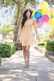 One of my favorite movies is Disney's Pixar's "Up" movie where the couple - Carl and Ellie - go on numerous picnic dates. In one of the picnic scenes she is wearing a yellow gingham picnic dress. I searched and searched for the perfect dress that would give off similar sunny vibes and found this dress! It is so perfect! I have received many compliments.  The lightweight material is perfect for picnic weather and the button detail is a nice touch.

Since I normally wear an xxs I found this dress a little too big for me but probably true to size for someone else who usually wears an xs. I made a few minor alterations to take up the straps and take in the back so the bust area would fit my petite frame.

Thank you Lulus! - Courtney E.