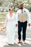 I wore this dress for my elopement in April and it was perfect! I did have to have it hemmed because it was a little long, and I had to have the sleeves taken in because they were pretty baggy. But, this is such an elegant dress and I know it will make for timeless photos! Plus, the back is gorgeous! - Adrienne W.