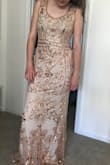 I ordered this dress as a bridesmaids dress for my sister. As soon as we opened the package we were in complete shock at how beautiful it was. The quality is incredible and it fits her perfectly. I couldn't be more happy with this purchase! - Julia D.