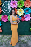 This dress was perfect for an outdoor dinner wedding. The fit was true to size and conforms perfectly to accentuate curves. The material is very good quality too. Would buy in every color. - Johanna S.