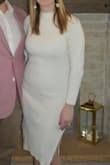 Perfect for our February engagement party and the compliments rolled in all night! The dress hugged my curves, so I paired with Spanx to have the smoothest look. I paired with white fringe earring from Lulus and white booties. I can't wait to wear this dress again next winter! - Hillary K.