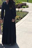 This dress had such an elegant feel to it. I had so many compliments on it. It accentuated my waist then flowed beautifully away from the body. My only complaint is the length,. I'm 5'9" and wore 3-4 inch heels and it was perfect, but it would drag if I wore flats or was shorter. Great quality material and the neck wasn't too low. - Aubriann B.
