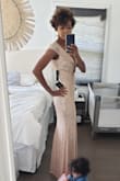 The product photo does not do this dress any justice. It's so much nicer in person. I order it for a formal birthday party. It fit perfectly, no adjustments are needed. I'm wearing it with a 3" Heel. I'm amazed by the price, I would have expected it to be much more for the quality. - Sheena A.