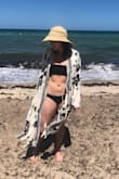 This is the best cover up ever! I love the material it is so soft. It is actually "Billabong brand" and I love it. I ordered a small but probably could of gotten an XS as the sleeves were long....  I wore it to the beach and around the house! Would recommend. :) - Rachael A.