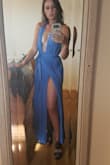Love this dress. Although the picture can be misleading. The cut in the middle is much deeper and much more revealing but I still loved it. - Dinah C.