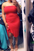 It kept on sliding down for sure. The glue thing at the top wasn't wide enough I suppose, but nonetheless I loved this dress. Definitely vibrant red, thick and good material! The slit wasn't too high. I was able to wear biker shorts that had a 5-6inch inseam with it, and it was good. The fabric does show anything underneath. Like you can see outline of your strapless bra and so on, but it was good. - Alcia G.