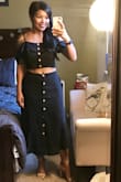 I love how you can pair each piece with something else and dress it up or down! I wore it to a wedding with some high heels and got many compliments! It's very comfortable and the fabric hangs nicely. I'm normally a size small with Lulus but had to size up to a medium. The size small on me pulled at the chest and the top button of the skirt pulled a bit too - so I suggest sizing up! - Sambo S.
