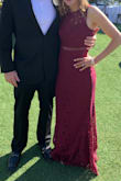 This dress is absolutely beautiful! I wore it to a black tie wedding in California, and I received many compliments on it. I am in between sizes and could have worn the small, but it would have been a little tighter in the hips. The medium was a little looser all around, but it was a comfortable fit for me. I could walk, sit, and dance. The material is great because it didn't wrinkle even when packed in my suitcase for two days of travel. It runs a little long, but I am taller and I had heels on. It barely touched the floor. I love this dress! - Katie P.
