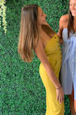 It's super cute, but it runs a little big at the bottom. I had to get it altered because I'm so short, but the top fit perfectly! It's super cute. - Diana