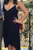 I wore this to a wedding, and it was suuuuuper hot. The fabric is heavier, but light enough to where I wasn't dying. It's good quality. The only reason I'm giving it 4 stars instead of 5, is because the back of the bodice fabric isn't perfectly aligned - it sort of rides up instead of laying flat. But, i'm sure I'm the only one who noticed. Nothing that should derail from getting it - also could have just been my dress. Otherwise, I loved it! Super flattering and I got tons of compliments. I paired with very simple nude, ankle strap stilettos. - Blaine F.