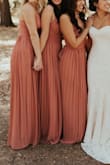 I ordered this dress for all of my bridesmaids, who range from 5'11" to 5'2". This was the perfect dress for all skin tones and hair colors and body types- I am extremely happy with this dress. It was twirly and gorgeous and photographed amazingly. 10/10 recommend! - Hailey L.