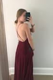 This dress is amazing! It's light weight but does not have that cheap quality feeling at all. I was going to order a small but after looking at other reviews I went with an XS and I'm very glad I did! If you're stuck between two sizes I recommend picking the smaller one as the straps are adjustable! - Samantha F.