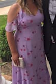 I'm normally an XL but the XL was sold out so I bought a L. I'm bigger around the belly so I couldn't zipper the back 100% without feeling uncomfortable BUT was able to tuck the top zipper part in and wear as a low back dress! It was snug so nothing was falling out. I received so many compliments and was feeling myself too. Length was perfect -skimmed the floor wearing short wedges. - Lisa O.