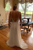 I ordered this dress after trying on tons of dresses in stores and just couldn't find the perfect dress. I even tried some other online sites for a dress, but still wasn't getting what I was looking for. I am getting married on a beach with just my fiance and I so I wanted something simple and to not spend a ton of money, so when I searched Google- Lulus came up. This dress is absolutely perfect! It's pretty long on me (since I'm short), so I'm going to get it hemmed and leave a little in the back for the train. I also am getting it taken in a little in the straps, but other than that, it fits like a glove! I am so happy with this purchase!!! I love the beading on the top, it looks like it is worth so much more than the true cost. The nude backing behind the top doesn't look as obvious in person as it did in the pictures on the site. It's very classy and elegant, but also sexy in the back. I am so glad I found Lulus so that I could say YES to the dress! - Madison P.