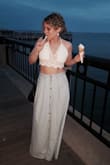 I absolutely adore wearing this skirt. I did have to get it hemmed, but it compliments my figure wonderfully. I'm usually a small/medium, (2-4) and I got this in a small. It can be dressed boho-chic-beach-festival style (ex: with a crocheted lace-up crop top) or more casually with a basic black tank! It's my favorite summer go-to! Comfortable and flowy, not at all heavy. - Elizabeth D.