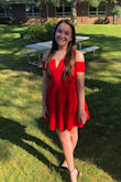 I wore this dress to my senior banquet and got so many compliments! I ordered a size small and overall it fits great. The only problem I came across was that the arm straps were a little tight on me, but nothing unbearable. Hopefully they might stretch out a little overtime. I can't wait to wear this again :) - Erin B.