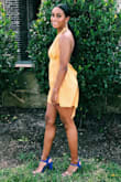 I wore this to my sisters graduation and got SO many compliments. I went with the extra small because of the reviews I saw but I would normally wear a small. I like my clothes to fit a little more exact though. Definitely need to wear spanks or some type of spandex under it. - Amaya C.