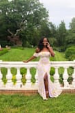 Classy, flirty, and romantic. Dress has enough stretch for you to dance the night away. Ruffled off the shoulder straps, side slit, and yellow floral pattern add the right amount of flare! - Kemi J.