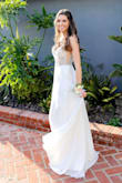 I wore this dress to my senior prom and I loved it! I should've had it tailored because it's long with a small train, and it did get danced on a bit, but I didn't have time. It's was so beautiful though it didn't matter. - Amy M.