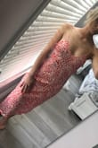 I was very excited to receive this dress. It looks exactly the same in person as online. I was pleasantly surprised by the quality. There is a double layer so no need for a bra. The straps are adjustable which is fantastic! Love this dress so much. Light and breathable. - Dre B.