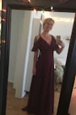 I normally don't wear a S, but it fits perfectly! It's also too long on me. That is rare, so I was very excited that I can wear it with heels! - Jessica H.