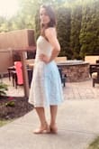 I received endless compliments on this dress! I got it for my rehearsal dinner, but decided to wear it all day that day leading up to the dinner. Ran some bridal errands, did a rehearsal at the venue and continued on to dinner all in this one dress. As I said, compliments left and right!!! And I has pockets!!! I mean come on. I had my phone, chapstick, hotel key card and car keys on me at all times. It was perfect for a busy day. The only thing is- the straps were a little long for me. I'm not so busty, more athletic. So I had them altered just a bit shorter and then the dress fit like a glove. Totally worth the minor alteration. Can't wait to wear it on my honeymoon too!!! - Julie O.