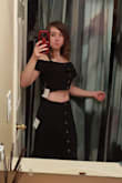Loved the fit of this dress. Fabric has no stretch, but that's fine since I don't need it to. There is a little elastic on the back of the skirt. Both fit perfectly. Skirt is long, but I expected it to after looking at the taller ladies and seeing where it falls on them. It's halfway down my calves since I'm short,  but I don't have a problem with it really. Can't wait to wear it to my beach vacations! - Brittni S.