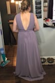 I got this dress for one of my bridesmaids to go with a mismatched theme. She is normally a medium/large. But had to get a size up (XL) for her. Hemline needed to be altered for a bit shorter. But it's worth it. She looked gorgeous on the day. - Julie O.