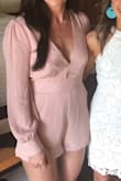 This romper was a perfect find for a bridal shower and I received a ton of compliments! It' s comfortable and the length is just right. The stripes are a metallic gold but not overpowering. It's also low cut but I didn't feel exposed. - Julie H.
