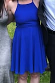 In the picture, it does look like it gave me some rolls. Make sure you don't tie it too tight. I think that's why it gave me the rolls. Very difficult to put on with just one person. The strings make it hard to navigate, so make sure you have someone to help you! - Erin H.