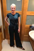 This jumpsuit is so comfortable!!! Perfect length with a 2" heel. Material is so soft and flowing! I dressed it up with a navy blazer due to the weather. I did take it to the dry cleaners to have them steam iron it. Highly recommend! - Allison P.