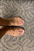 I really like them when they first came the slide were really tight, but I figured because they are plastic they would get loose, and they did! However the faux leather makes the bottom of my feet slide some! Really sweaty feet not that cool. - Cristina A.