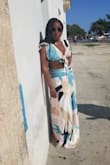 I wore this in Cuba while on a cruise and got a ton of compliments. The top is very comfortable, not too revealing. The skirt is flowy and long. I wore platform sandals with it so I did not have to hold my skirt up the entire time. Can't wait to wear it again this summer! - Lanita B.