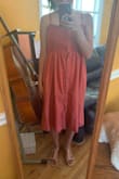 I love this dress because the length is modest, it flows very well and while it's not heavy it's also not see-thru! The only complaint I have is that right at the waist under the elastic top, there is a hole created between the buttons (see the second picture). But overall this dress is super cute and I can't wait to wear it this summer! - Amanda L.