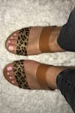 The sandals are cute and comfortable. Downside, little on the small side. - Nathalia P.