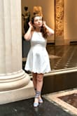 I call this dress the perfect LWD (Little White Dress) because it is super darling and cute! My favorite part about the dress is the cross back detail. Simple, elegant, and resonating a Grecian goddess. - Jennifer S.