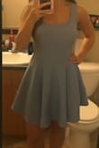 The dress fit exactly how I wanted it to! Perfect length and style for what I wanted it for. The fabric is surprisingly thin though, the outline of my bra shows through the fabric in the back however this isn't a big deal to me as my hair is long. - Jessica D.
