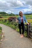I'm pretty tall - 5'9" - 5'10" -  and this Large fits perfectly. Love that the back doesn't have any coverage - it means I can wear this with white pants, shorts, you name it! I bought it in both a black and the mauve and love both. - Samantha W.