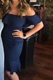 I loved this dress, originally ordered in a medium which is my normal size and it was a bit big. So I returned and got a small. Fit like a glove! I got so many compliments all night. Super flattering and the ruffles make it all the more fun and spunky, yet still elegant and classic. - Rebecca E.