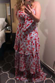 I absolutely love this dress. I wore it for dinner on a cruise. It's comfortable and flattering. I felt a little bit like the red dress emoji but in a good way! I would say it runs true to size maybe a tiny bit large. - Kara Z.