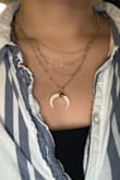 I really like this necklace. I received many compliments, but it seems to get tangled easily. - Maria A.