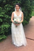Great value and a beautiful dress! I wasn't sure of this dress when I first tried it on (I thought it might be too simple) but once I added my accessories, I truly felt like a bride! It is elegant, airy and romantic. I got soooo many compliments and no one could believe the price point! - Ashley D.