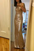 The size is fitting very well and the dress looks just as expected. - Marie P.