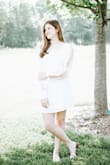 Dress looks nice on. Nice material. My daughter really liked the dress. Kind of blended in the with the light of the sun. - Leah C.