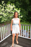 I wore this dress to my graduation. I received many compliments. The lacing on the top of the dress is beautiful. I'm glad I purchased it. - Lauren H.